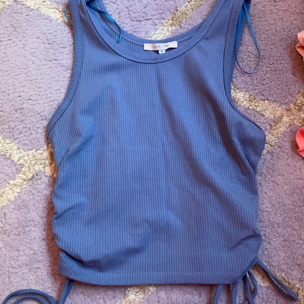 Tank with laces